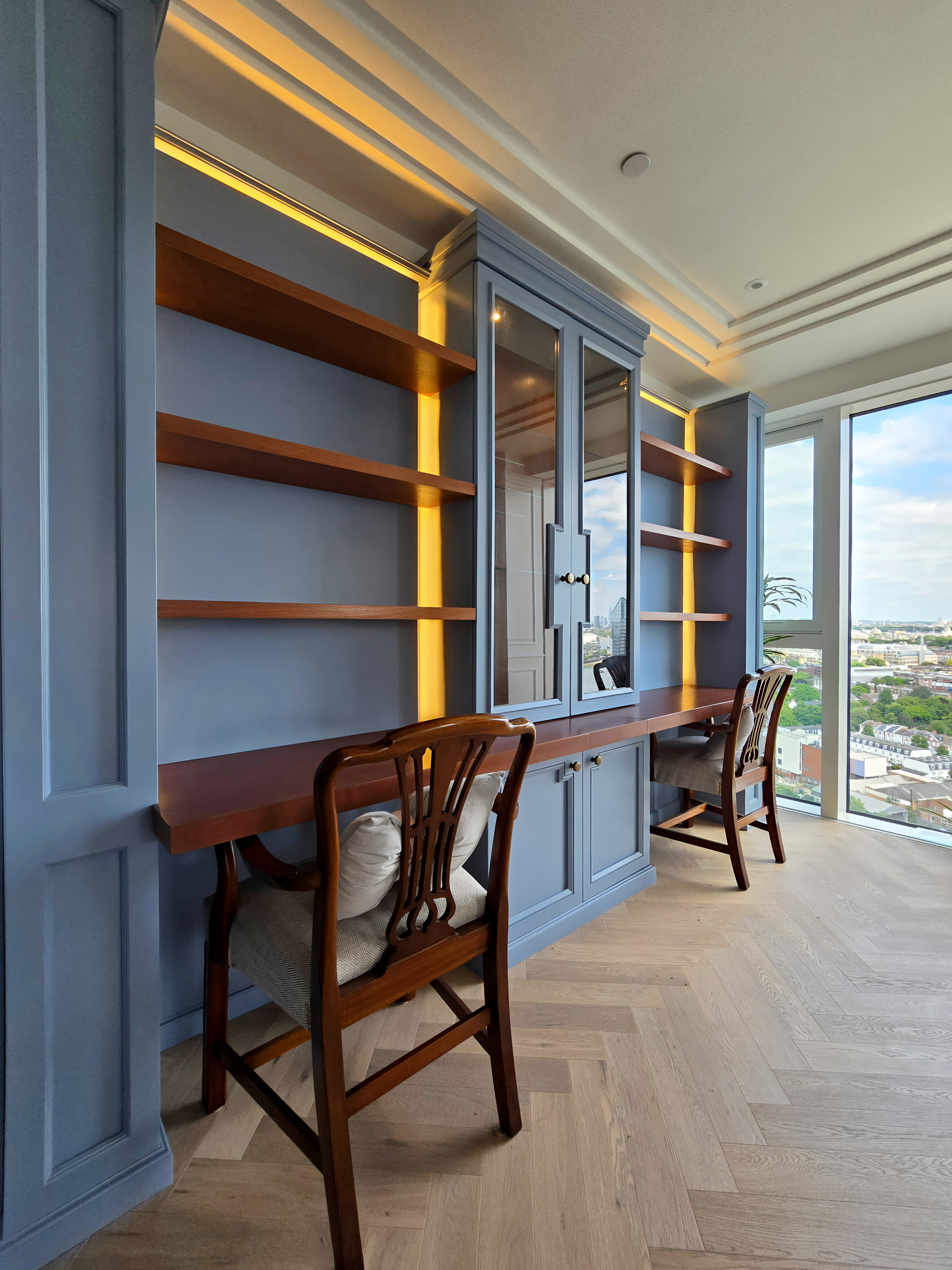 Dusty blue fitted library unit and home office joinery, Chelsea Creek, London