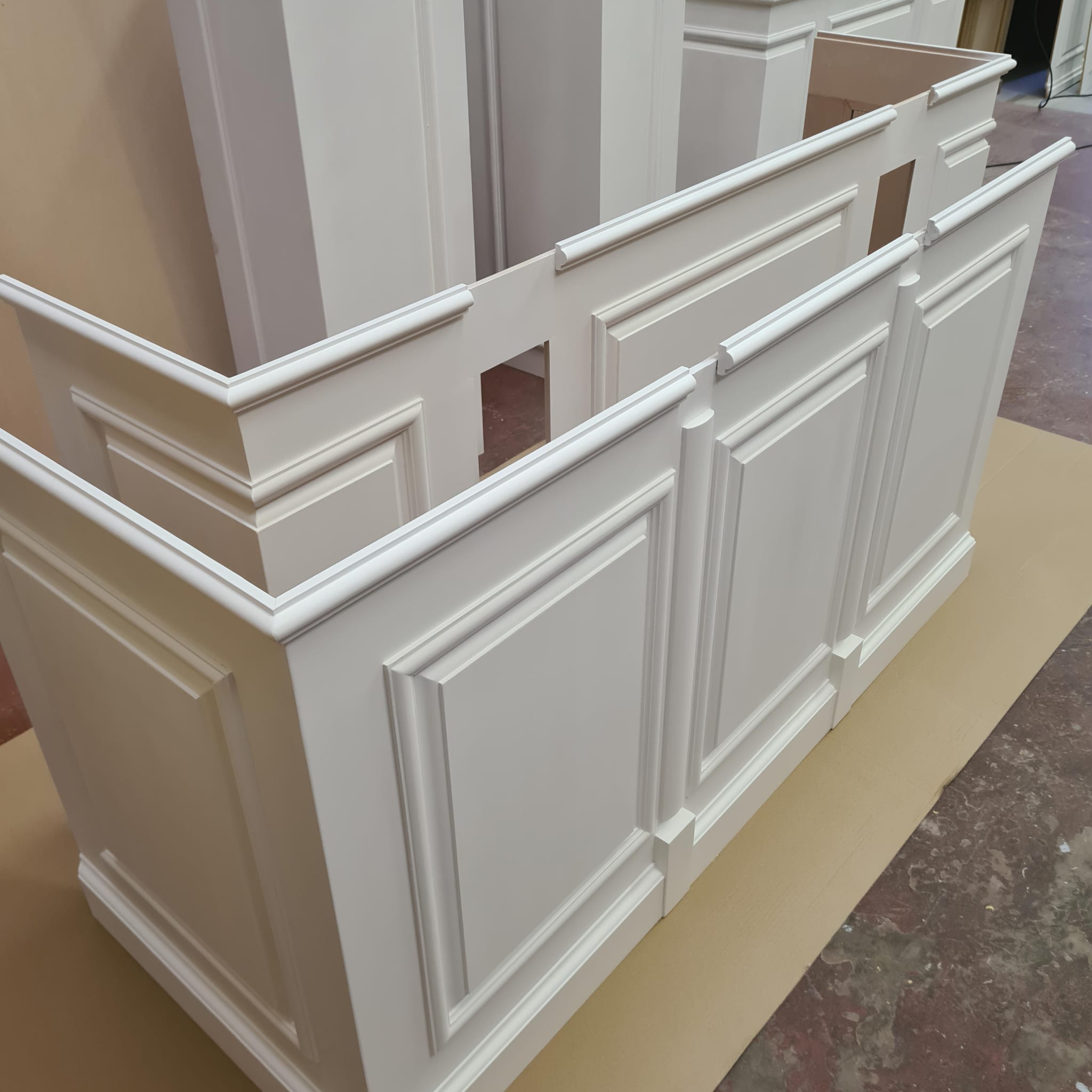 Corner wall panels assembled in the workshop, ready for delivery and installation