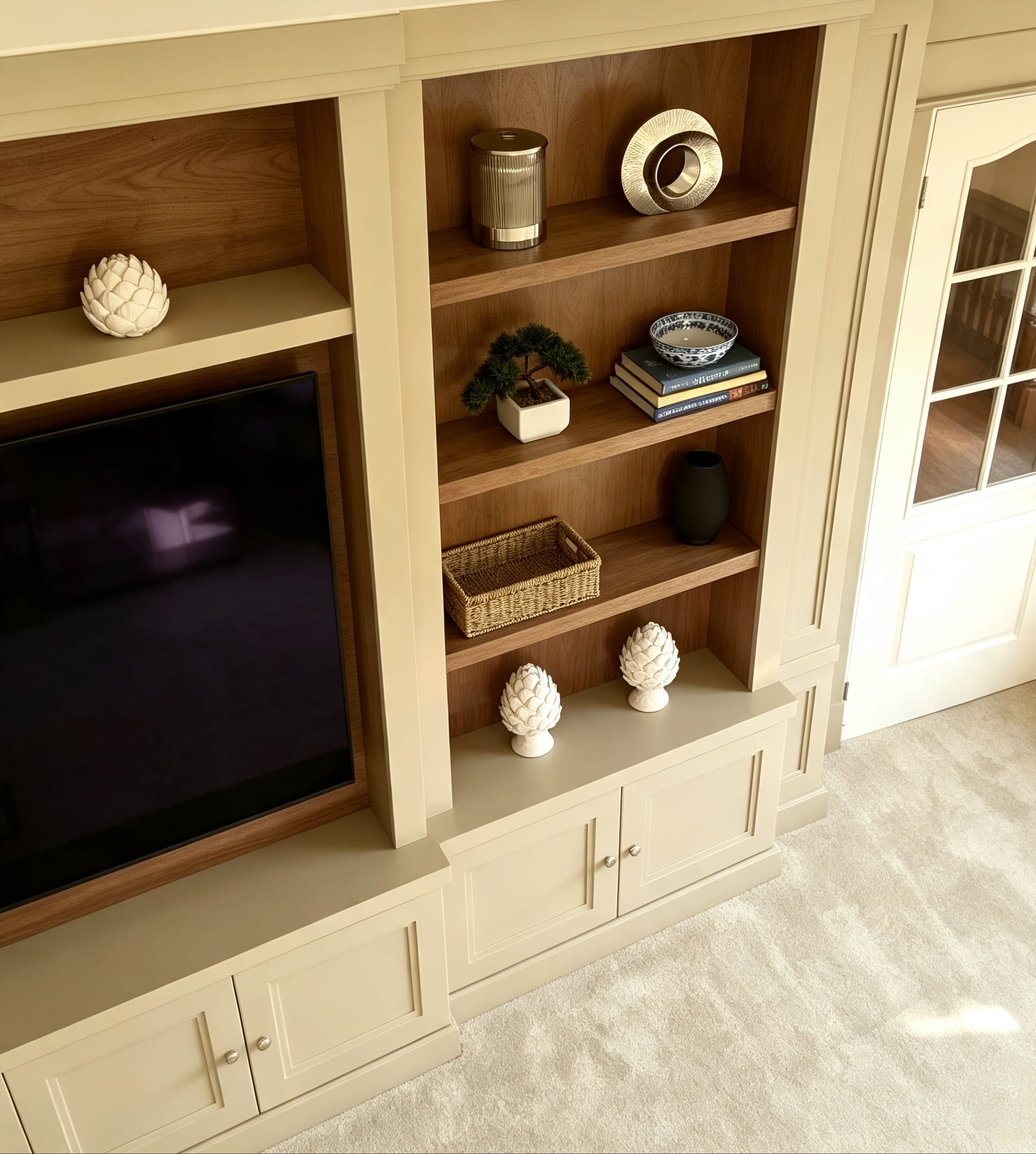 American walnut back panel and thick display shelves on a Brentwood media wall