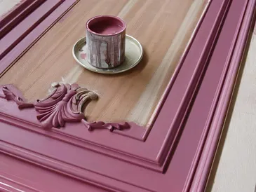 Hand-painted mauve Patina furniture panel with carved decorative detail