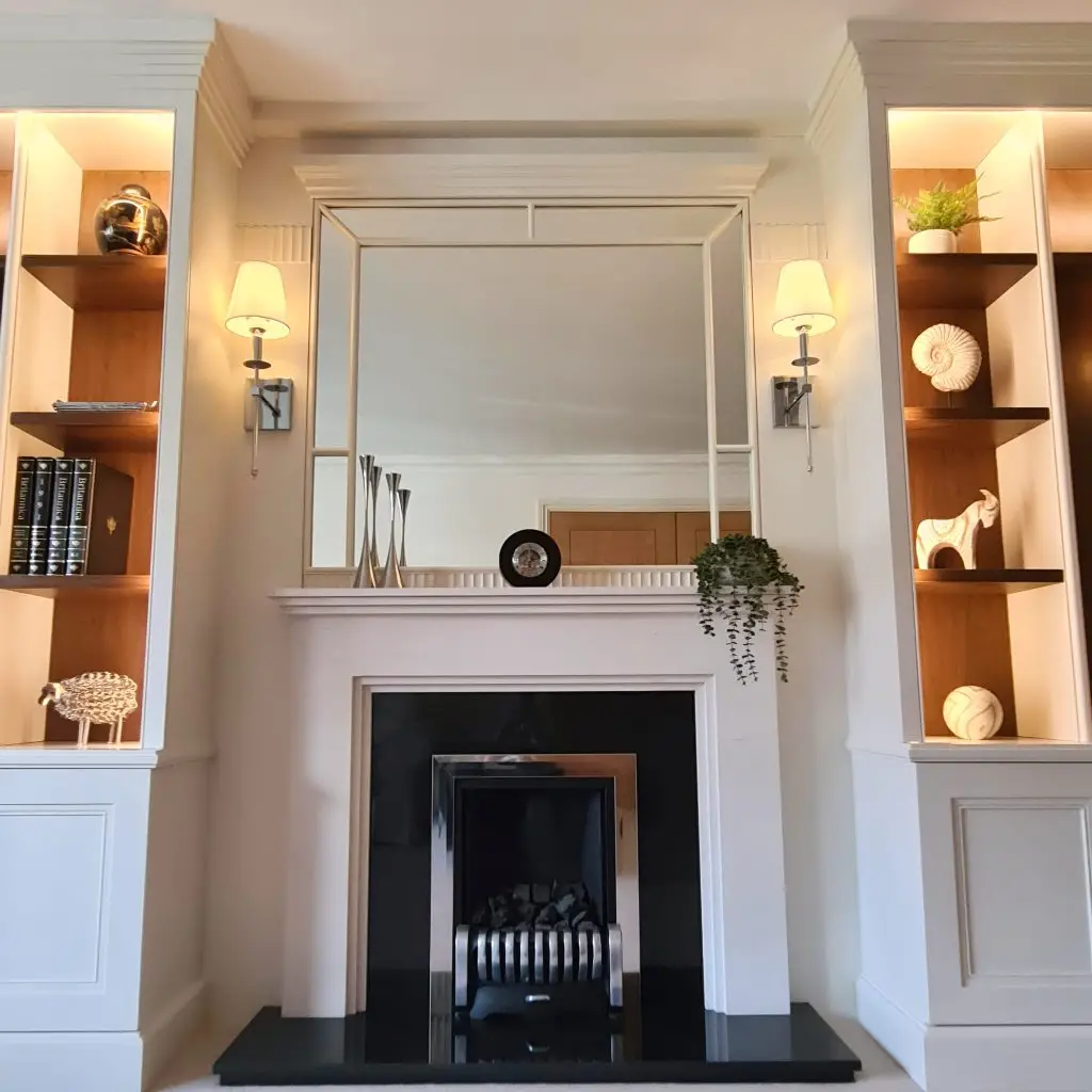 Classical fitted living-room joinery designed to frame a fireplace in Ruislip