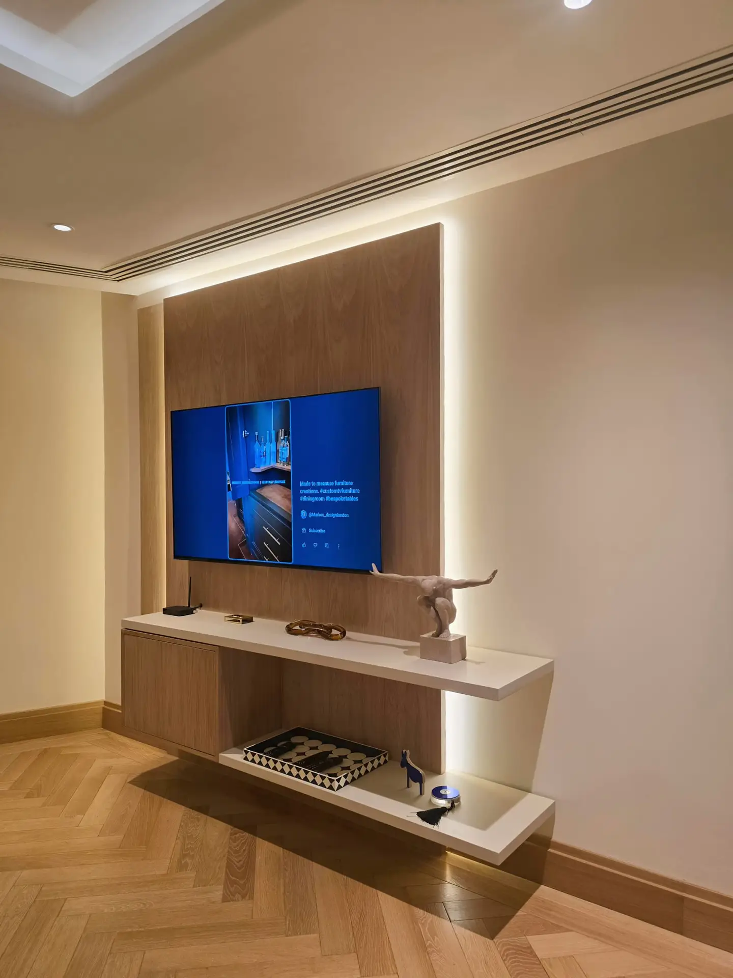 Floating shelf and cabinet detail on the Westminster TV wall