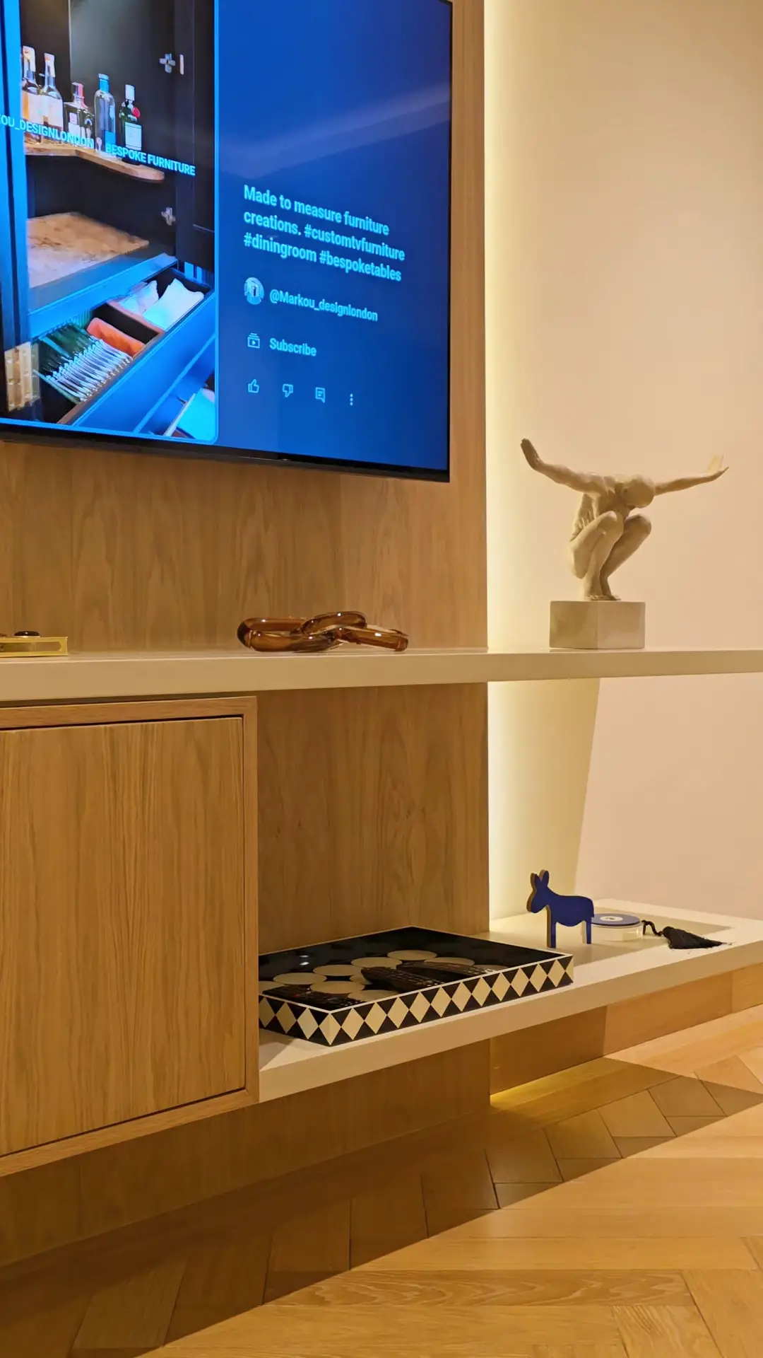 Integrated cove lighting on the Westminster floating media wall