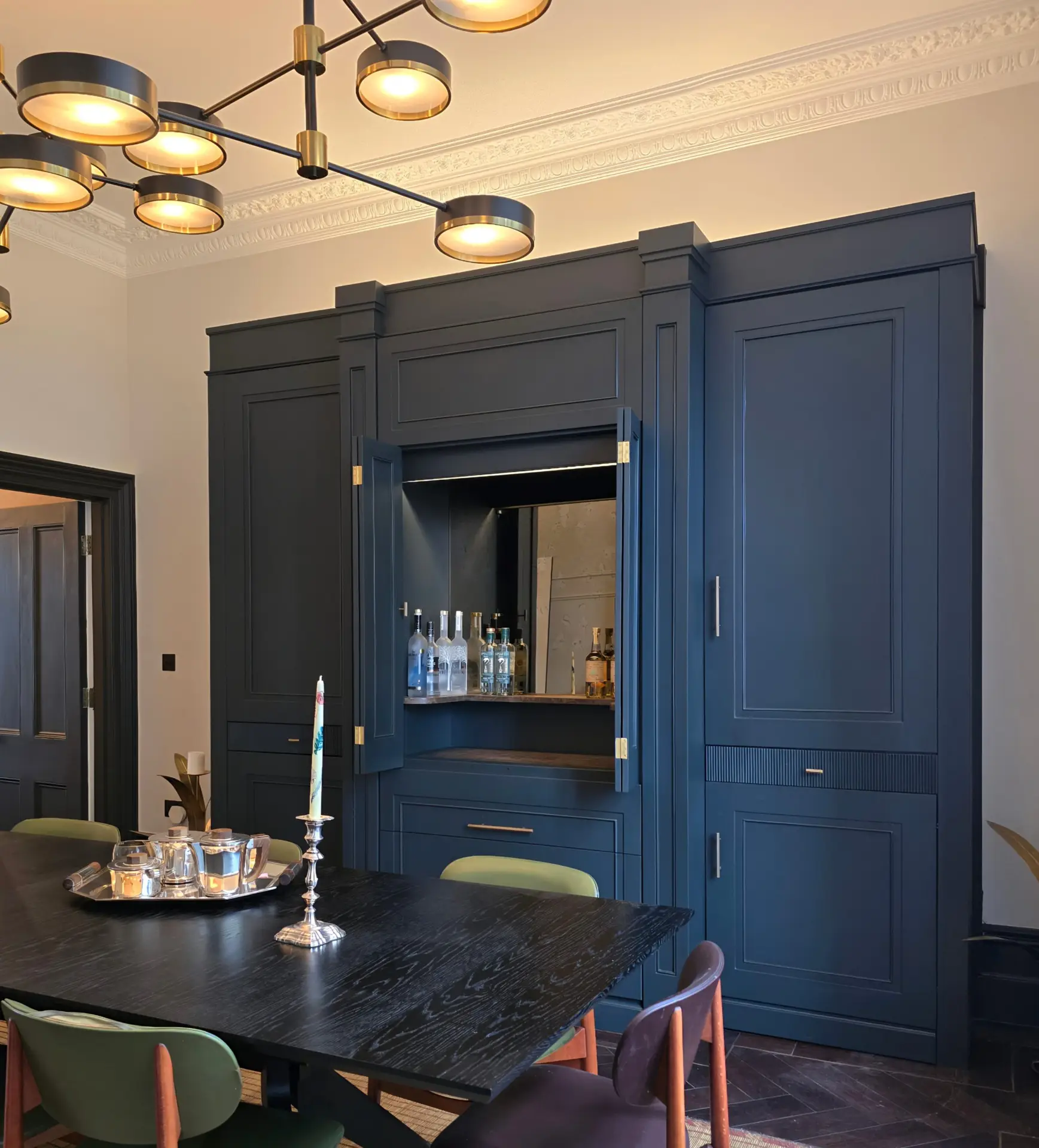 Mirrored drinks cabinet with fluted drawer detailing in Saint Ann's Villas