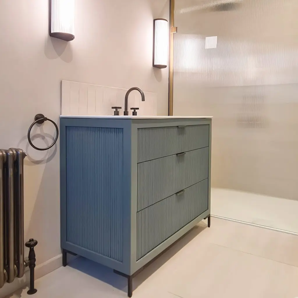 Fluted sage green bespoke vanity unit in Wimbledon, South-West London