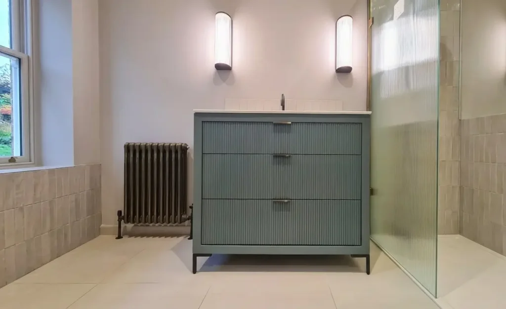 Fluted sage green fitted bathroom vanity unit, Wimbledon, London