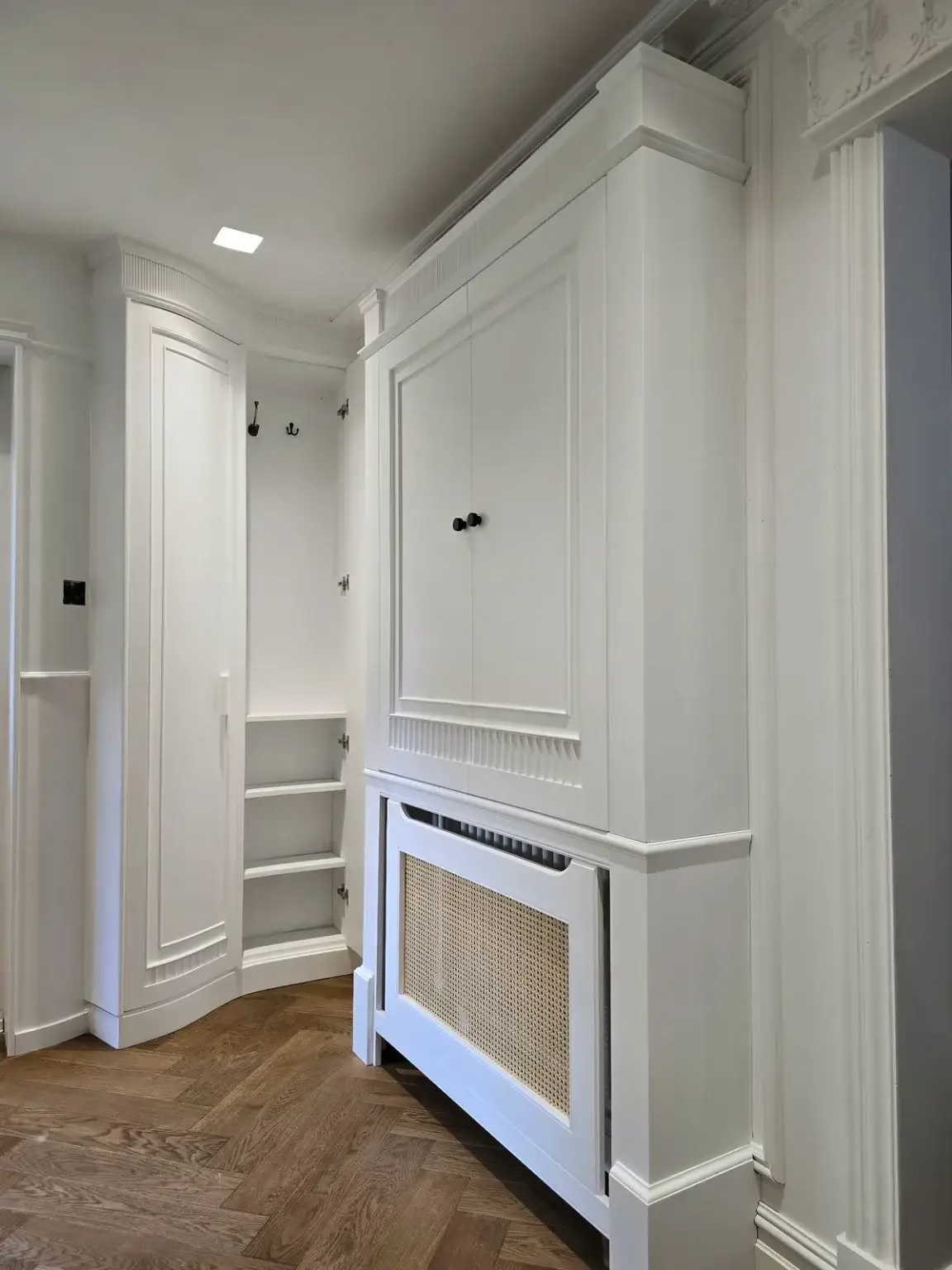 Panelled fitted hallway shoe cabinet and radiator cover in Camberley, Surrey